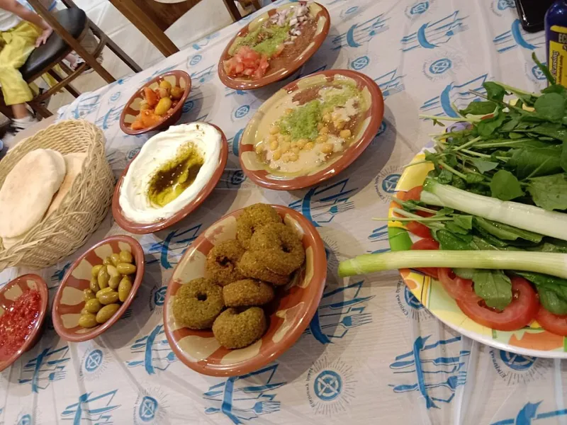 Between the Hummus and the Headlines: What an American Menu Won't Say Out Loud